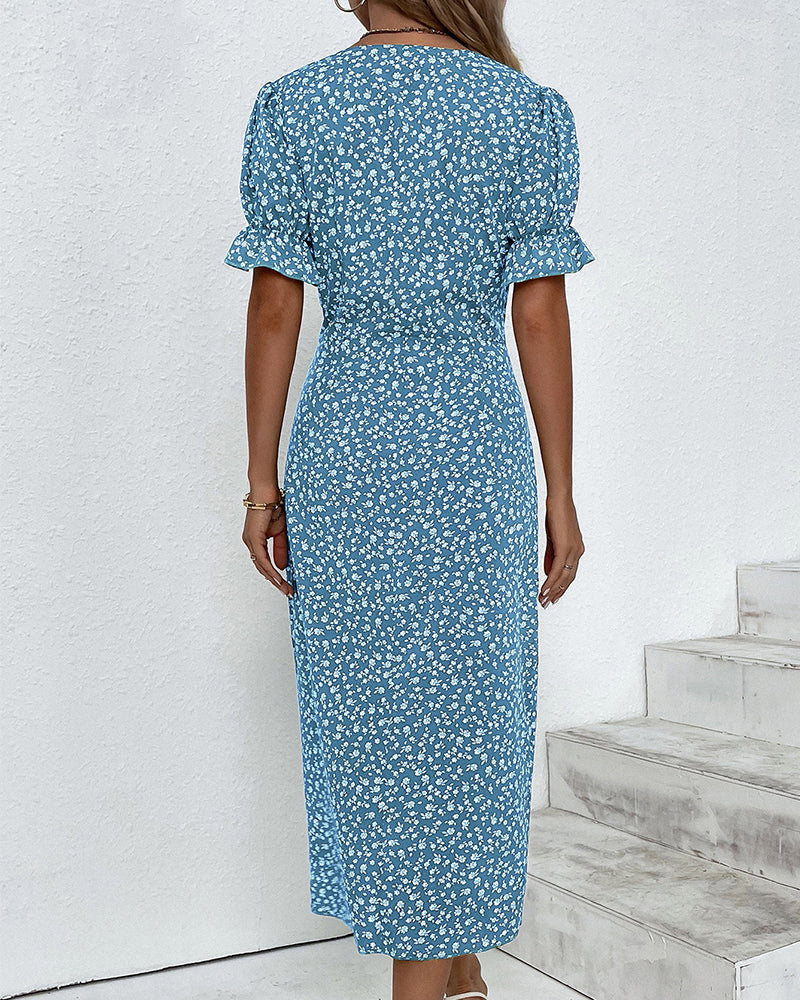 Plus size women's elegant floral print V-neck flowy midi dress. Comfortable summer day fashion for all.