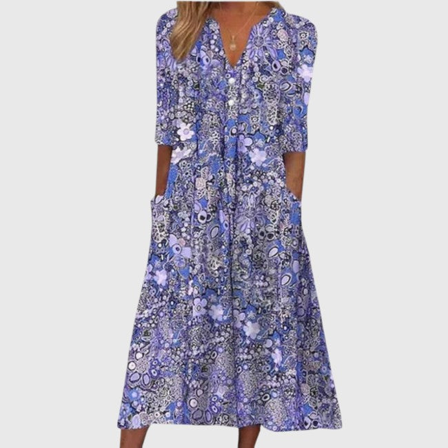 Elegant women's floral print V-neck midi dress. Perfect A-line half sleeve for spring and summer casual or day wear.