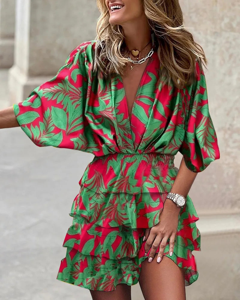 Flowy floral print tiered wrap dress for women. Feminine A-line style ideal for brunch dates & elegant occasions.