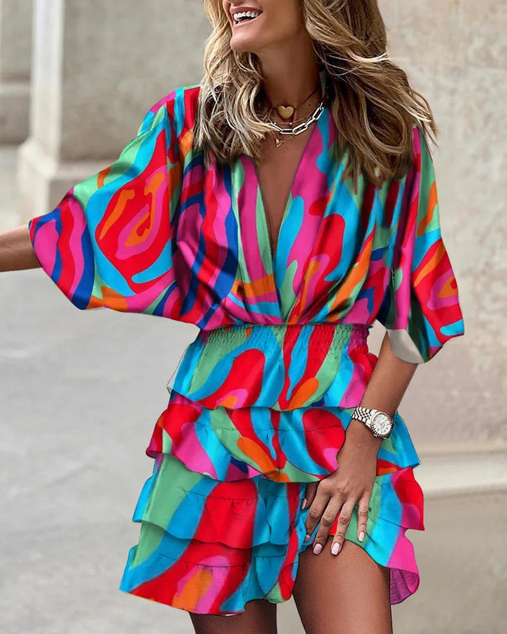 Stylish A-line women's floral print wrap dress with elegant tiered ruffles. Ideal for date night or autumn events.