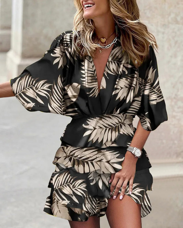Feminine women's long sleeve floral wrap dress. Elegant tiered ruffles & A-line cut, perfect for a flowy, chic look.
