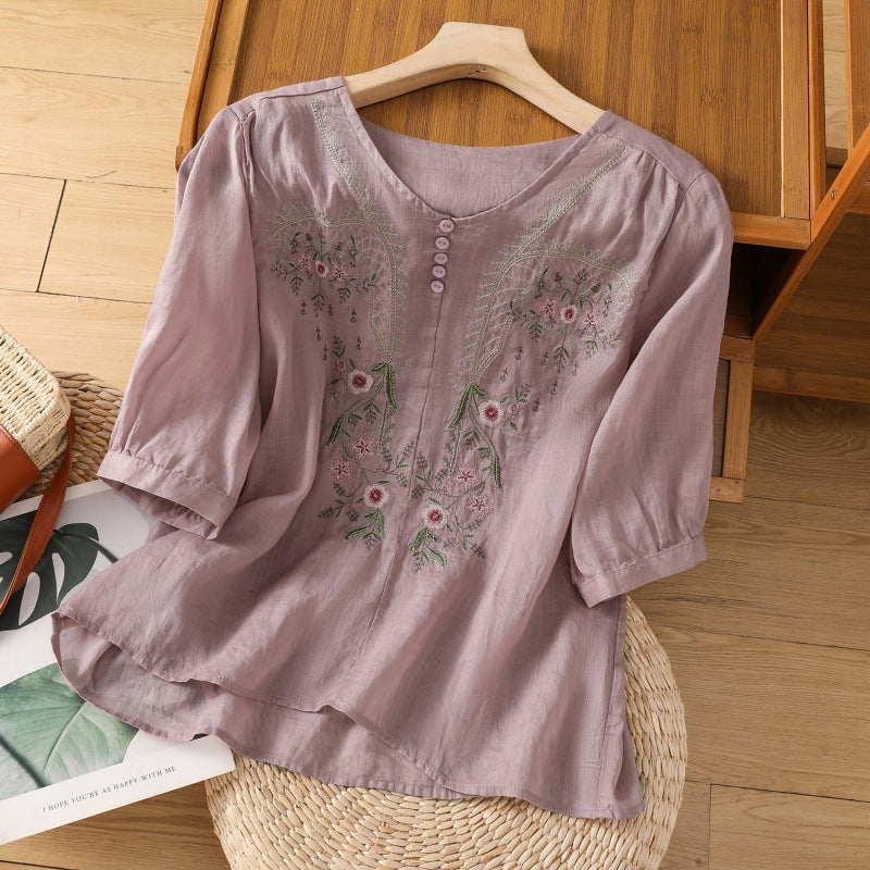 Relaxed fit women's floral V-neck blouse for casual wear. Comfortable and stylish for spring & summer.