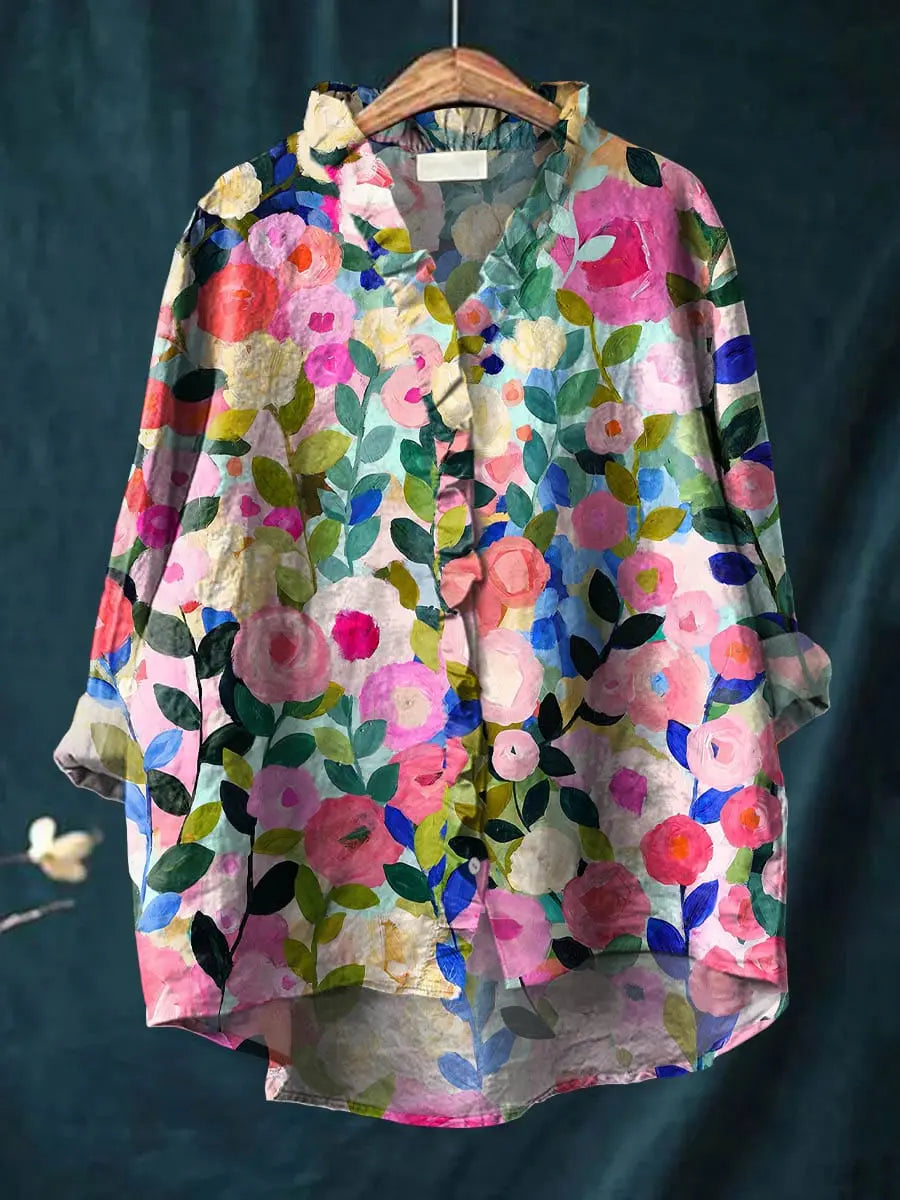 Elegant women's floral ruffle blouse, perfect for summer casual wear. Features a beautiful printed design and flowy fit.