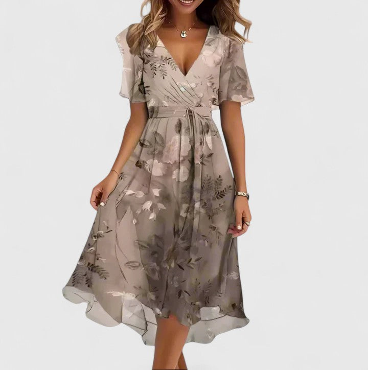 Elegant women's short floral dress featuring flutter sleeves and a distinctive high-low hem for a unique look.