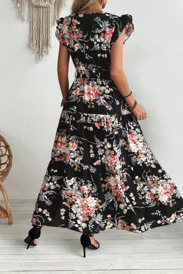 Long women's elegant floral swing dress, belted for a flattering fit. Great as a summer party, vacation, or casual dress.