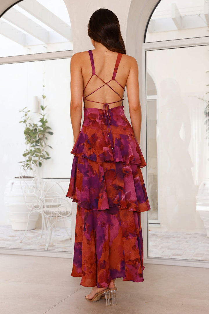 Elegant women's dress: floral tiered maxi, a versatile sleeveless piece for spring.