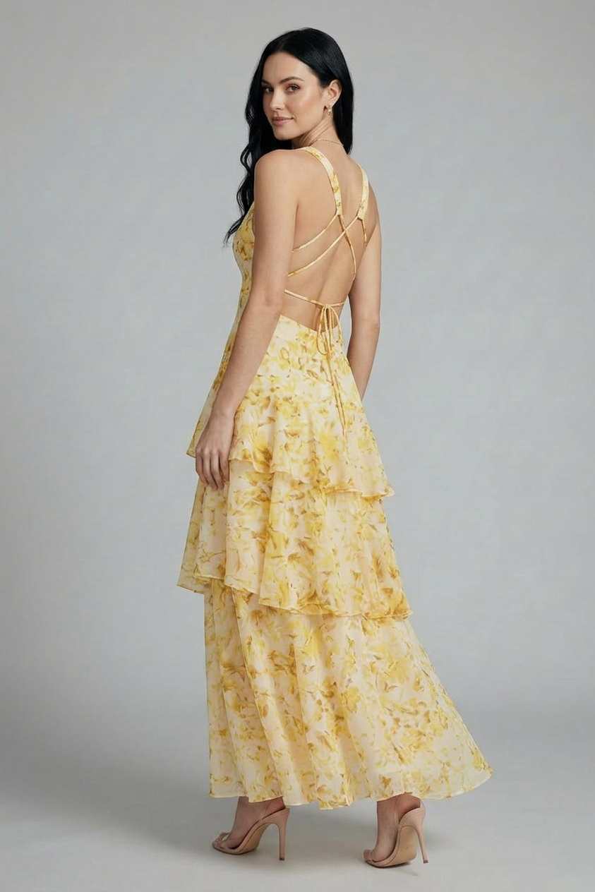 Graceful women's flowy floral tiered maxi dress. Sleeveless V-neck design, perfect for elegant summer comfort.