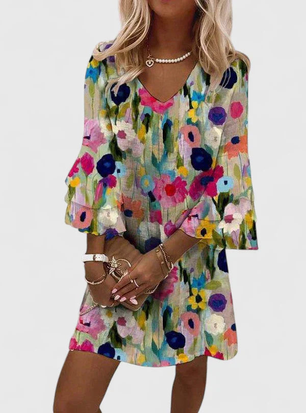 Elegant women's floral V-neck mini dress, perfect for summer parties or chic date nights. Flattering fit.