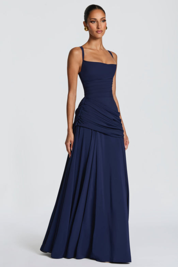 Elegant women's flowing maxi dress for all occasions, chic and flattering fit, perfect summer or evening wear.