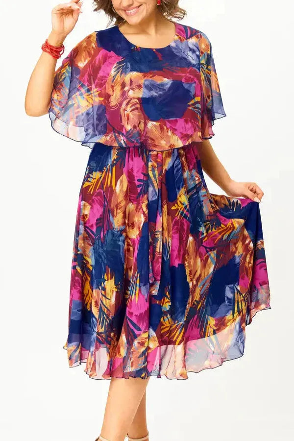 Elegant women's flowing midi dress in a timeless style, perfect for versatile spring & summer wear.