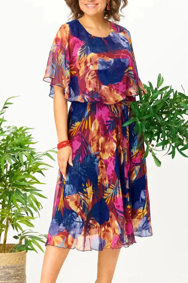 Sophisticated women's midi dress with a flowing silhouette, ideal for elegant spring & summer occasions.
