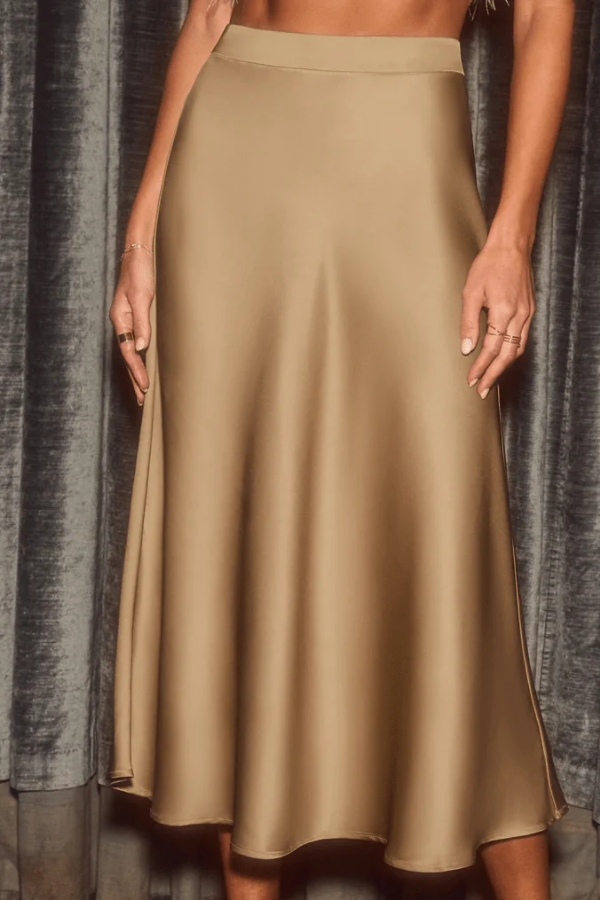 Elegant women's flowy A-line midi skirt, high-rise, perfect for modern sophisticated style.