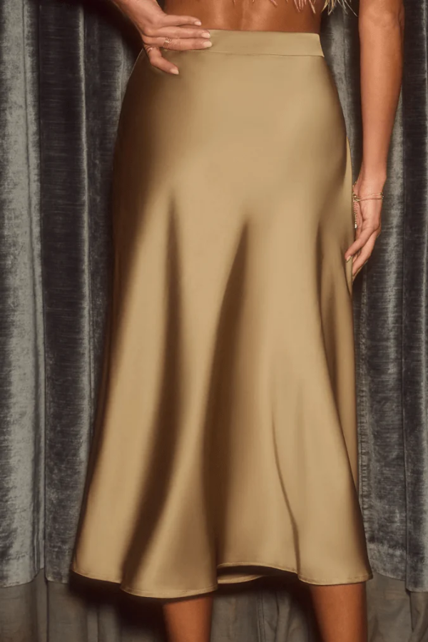 Sophisticated women's midi skirt, elegant A-line flowy design. Perfect for office or evening wear.