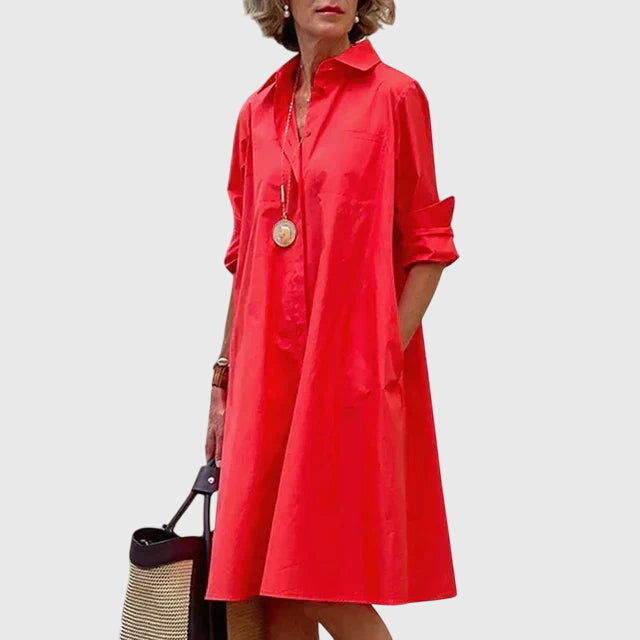 Elegant women's flowy dress with practical pockets, perfect for chic spring & summer style.