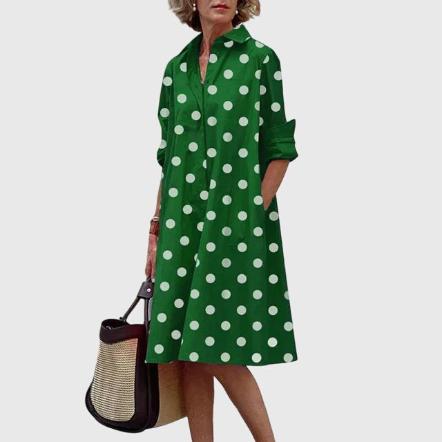 Versatile women's flowy dress, elegant and casual with convenient pockets for spring & summer fashion.