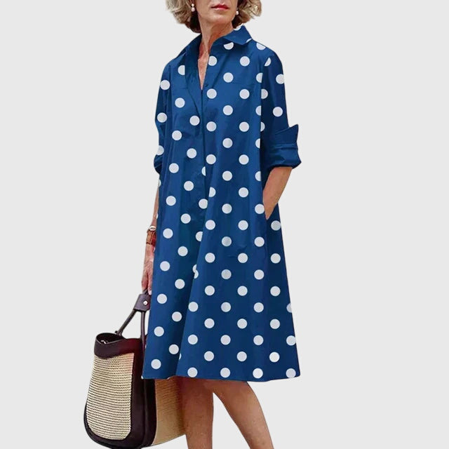 Women's elegant casual dress, a comfortable flowy design with practical pockets for everyday wear.
