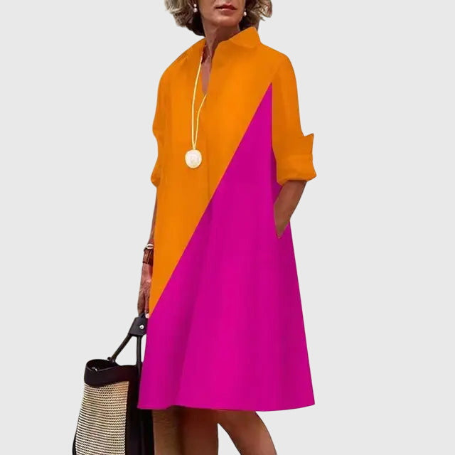 Chic women's spring dress, featuring a beautiful flowy silhouette and essential pockets.