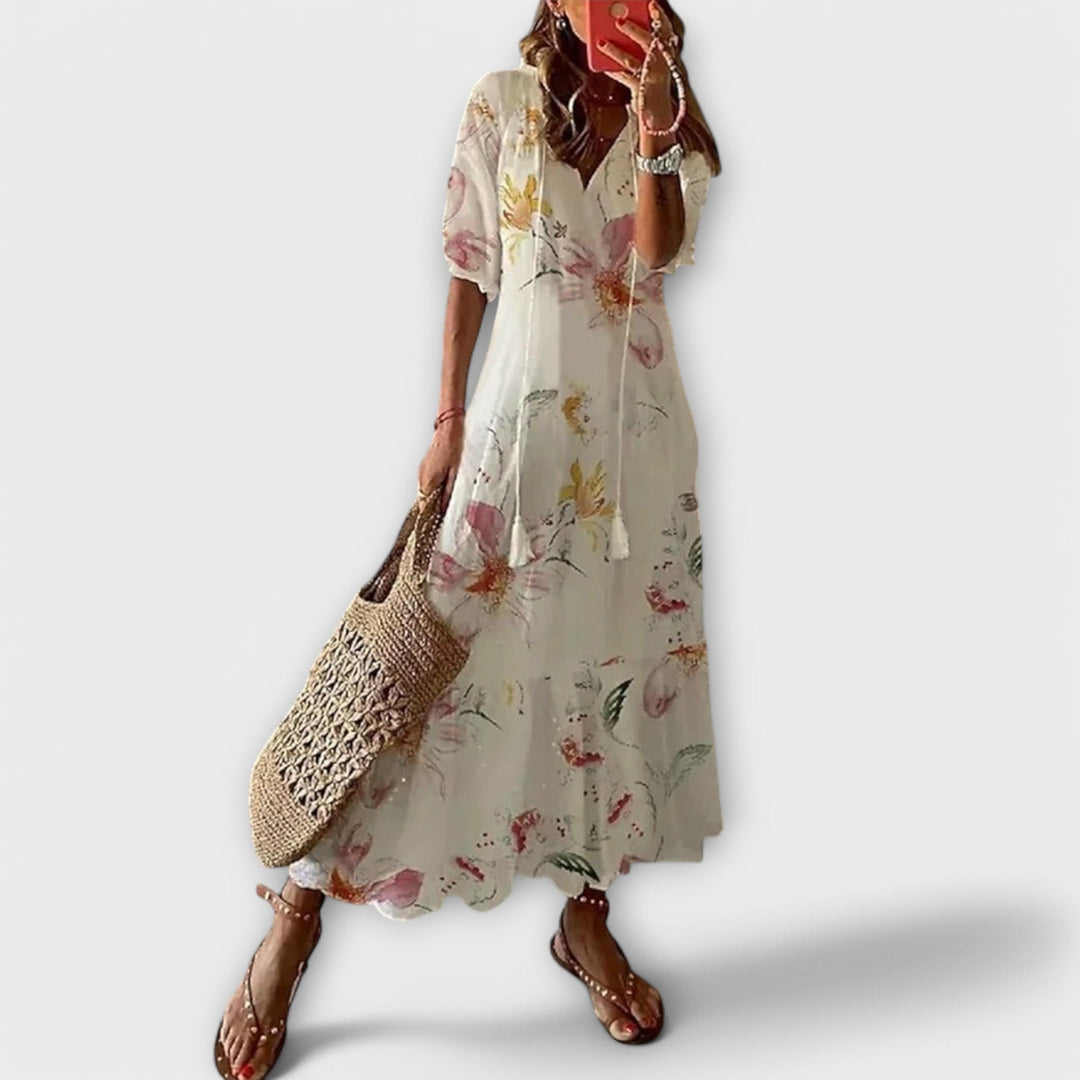 Women's elegant maxi dress with a flowy silhouette, embodying effortless style for any season.