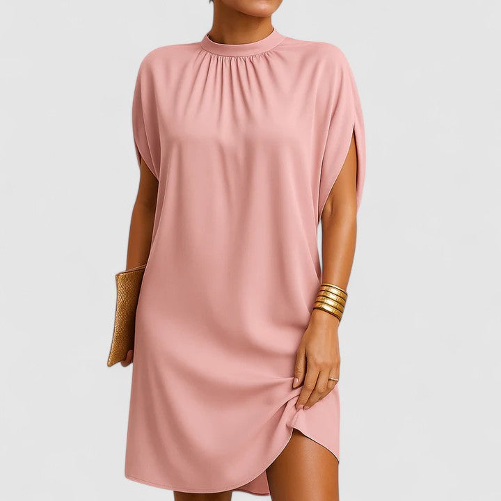 Elegant women's flowy maxi dress with chic shoulder cutouts, perfect for evening wear or summer parties.