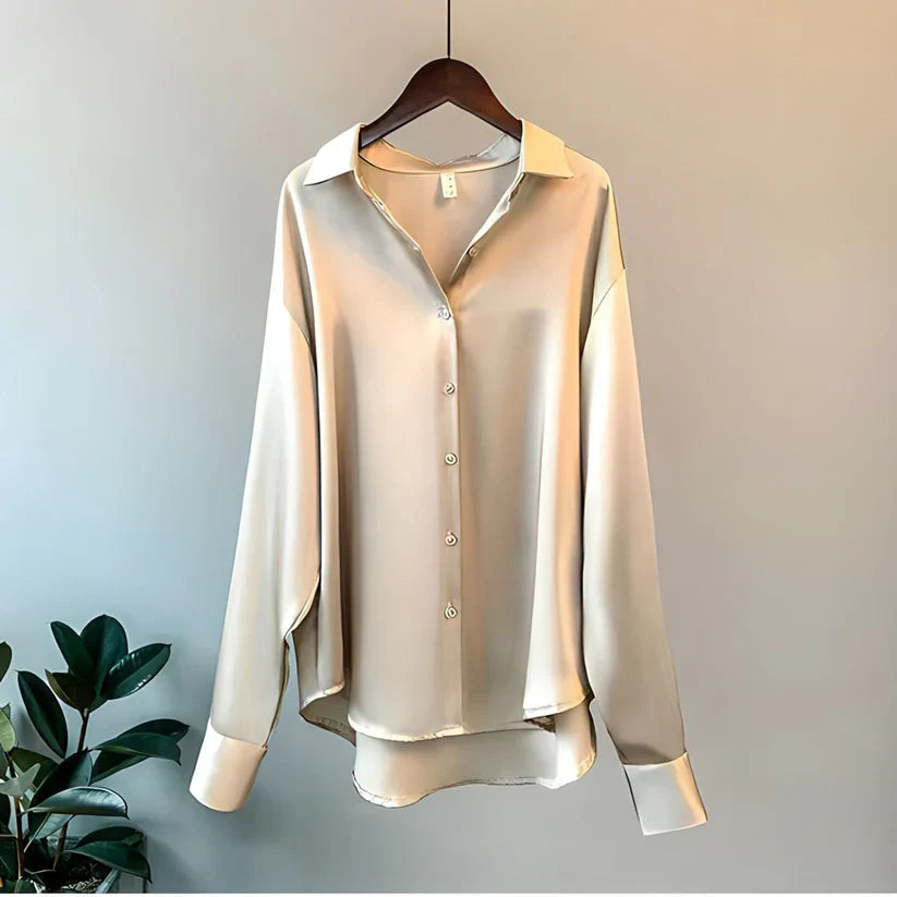 Elegant women's flowy oversized button down blouse, perfect for versatile workwear or casual chic fashion.