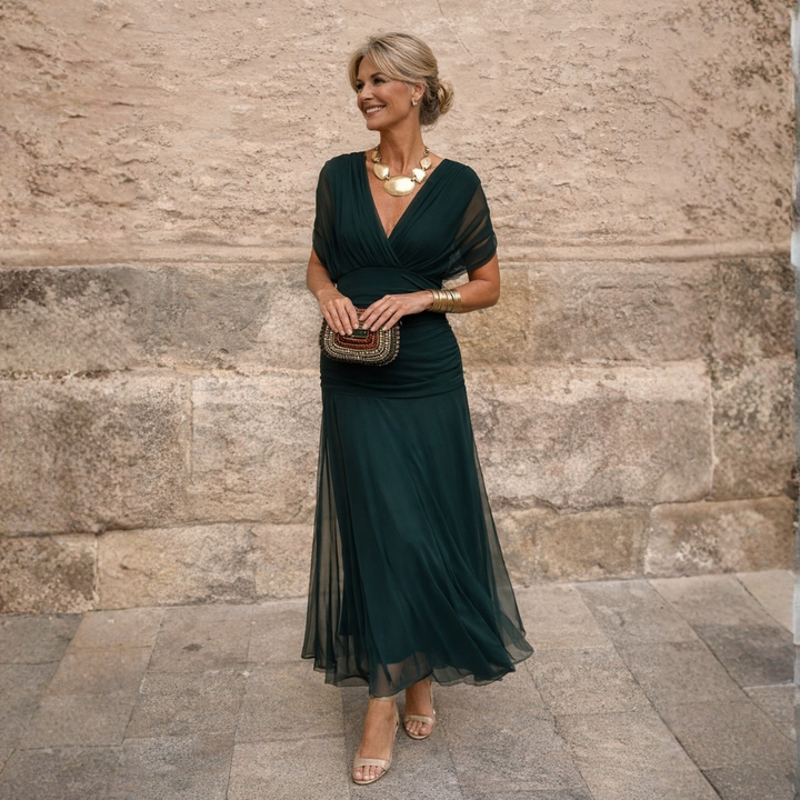 Elegant women's gathered V-neck midi dress with flutter sleeves, perfect for special occasions & evening events.