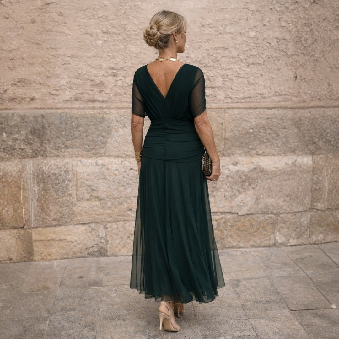 Timeless women's formal midi dress, V-neck, flutter sleeves, A-line cut, perfect for any special occasion.
