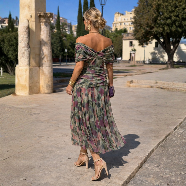 Classic women's V-neck midi dress with flutter sleeves, an elegant choice for cocktail and evening events.