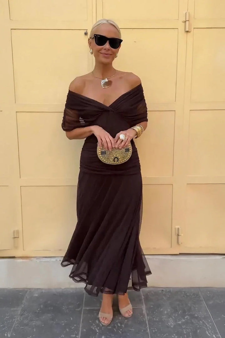 Women's formal midi dress featuring a gathered V-neck, delicate flutter sleeves, and flowing A-line silhouette.
