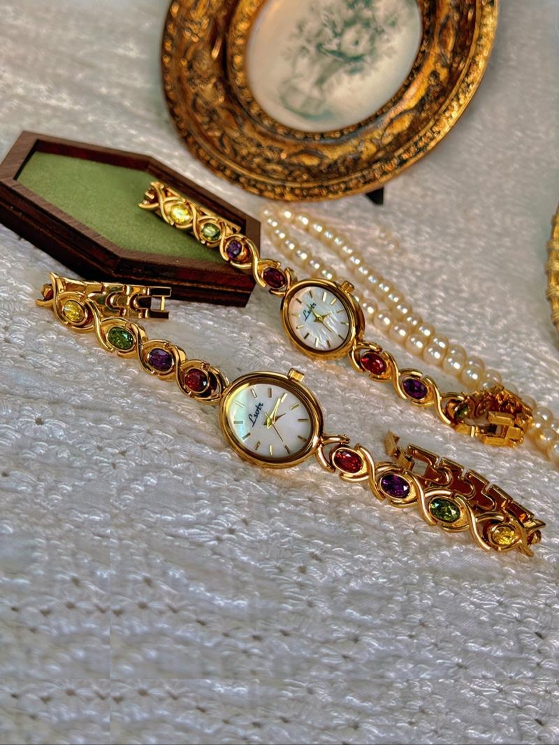Fashionable women's watch featuring a vibrant gemstone bracelet, combining a timepiece with an elegant accessory
