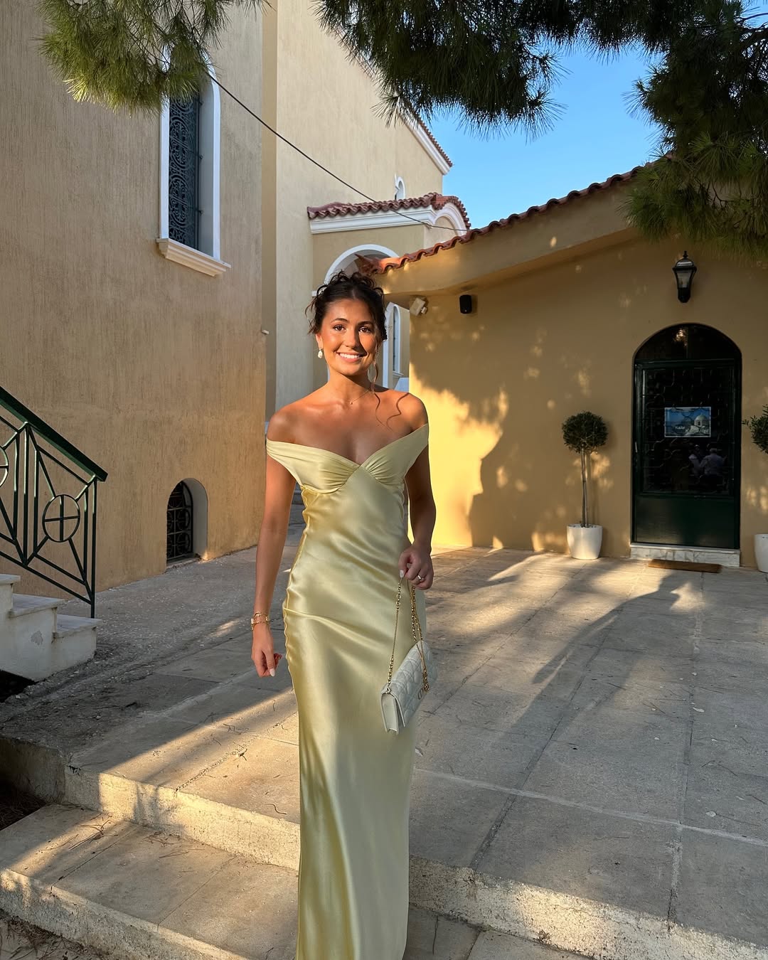 Beautiful gold off-shoulder maxi dress for women, a formal wedding guest gown designed for elegance & comfort.