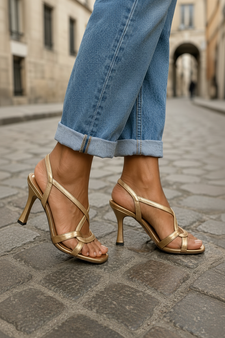 Chic women's formal golden heel sandals, a fashionable choice for evening shoes & wedding guest attire.