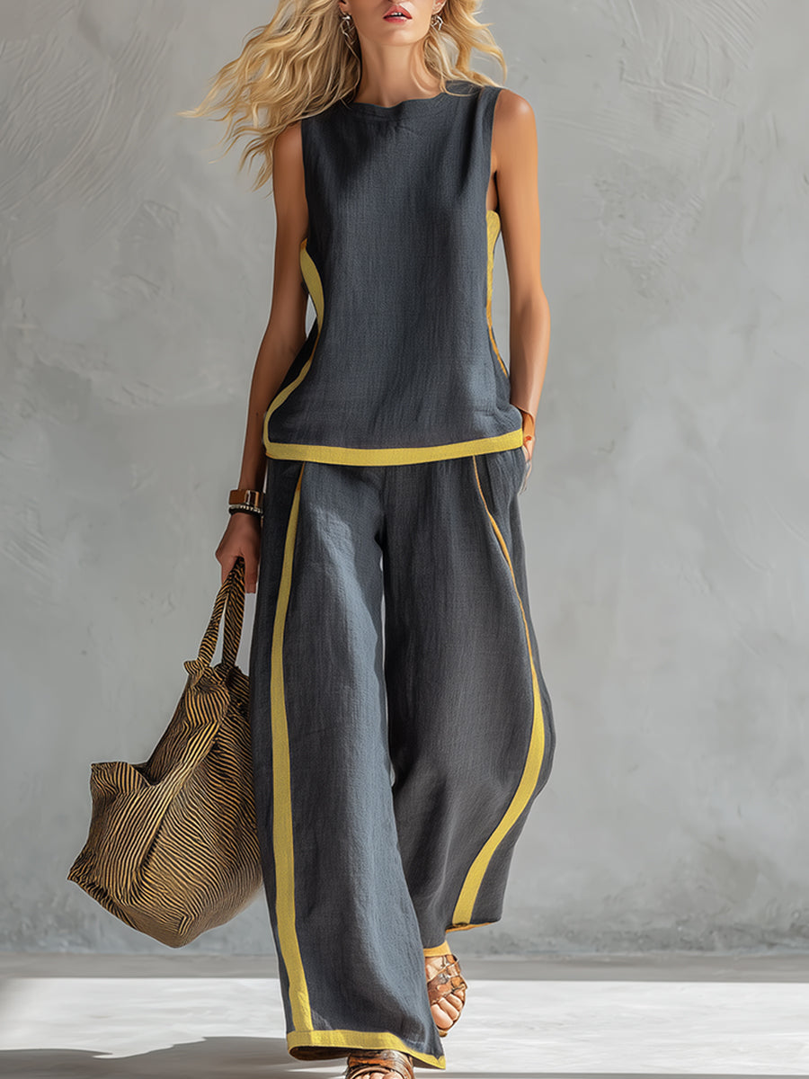 Elegant women's gray two-piece vest and pants matching set. Chic co-ord for versatile professional or casual wear.