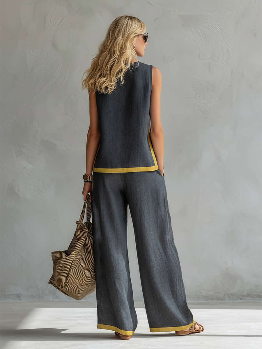 Sophisticated gray tailored pants for women, part of an elegant two-piece matching set. Versatile style.