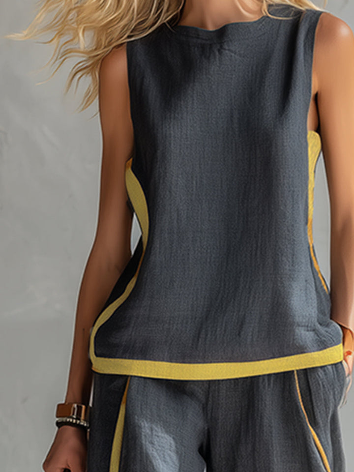 Women's chic gray matching vest and pants set. A versatile two-piece co-ord for elegant or casual looks.