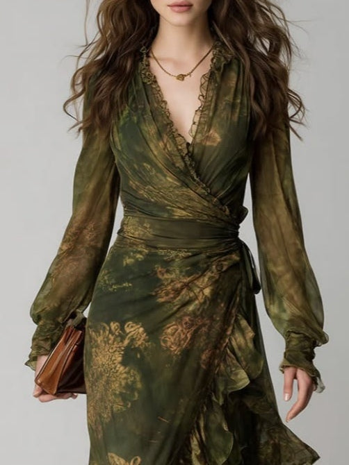 Flowing green floral long sleeve wrap maxi dress with elegant V-neck & tiered ruffles for women. Autumn fashion.