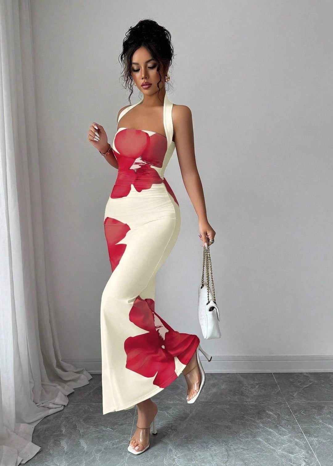 Elegant women's halter maxi dress with vibrant floral print, ideal for summer fashion & resort wear.