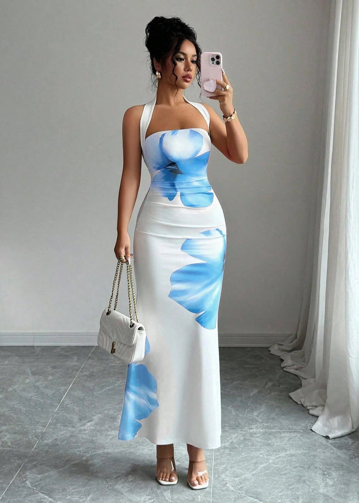 Flowy women's sleeveless maxi dress, perfect as elegant resort wear or a statement summer occasion dress.