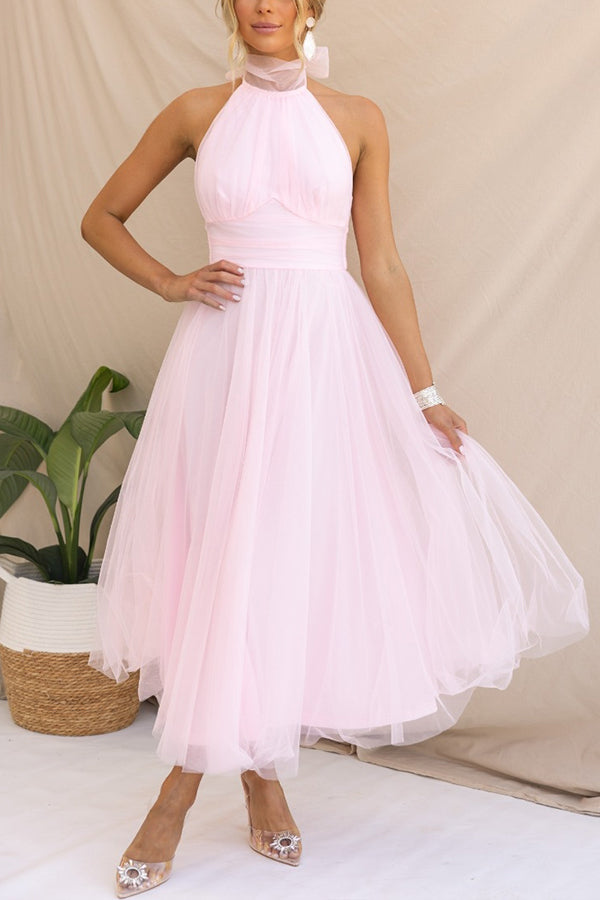 Women's elegant halter maxi dress, a sophisticated long gown for special occasion & wedding guests.