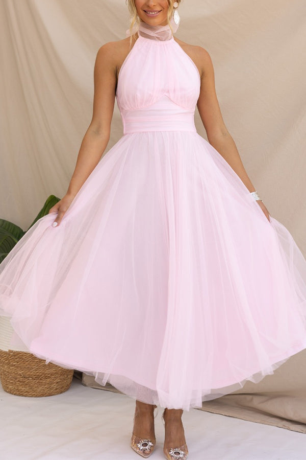 Sophisticated women's elegant halter maxi gown, perfect formal evening wear for wedding guests.