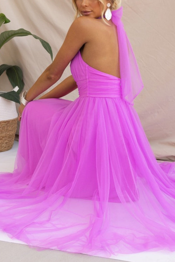 Elegant women's wedding guest dress, a beautiful halter neck maxi gown for formal evening occasions.