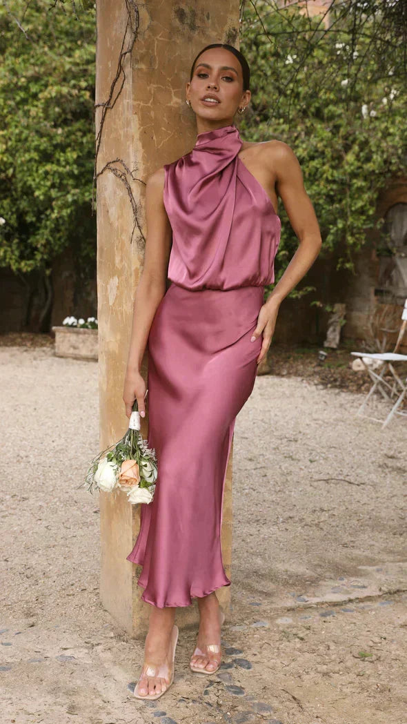 Beautiful women's elegant halter midi dress, designed with a flattering, flowing fit for formal and party wear.