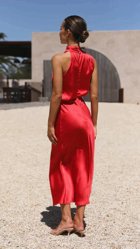 Sophisticated women's halter midi dress, offering a flattering flowing design for elegant comfort at any event.