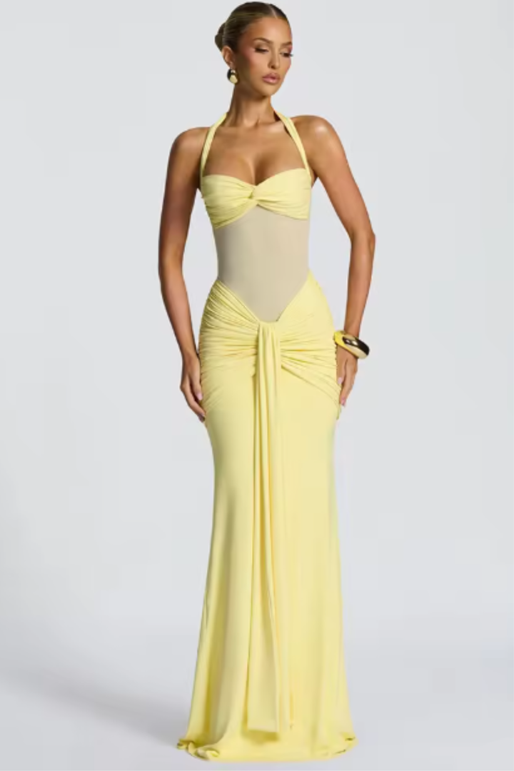 Women's special occasion halter neck maxi dress, featuring a flattering bodycon fit and stylish ruched details.