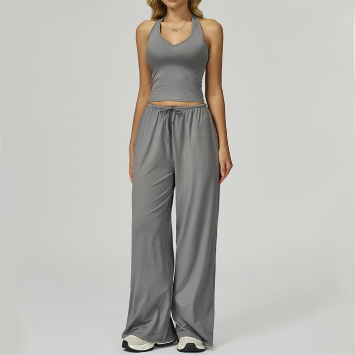 Stylish two-piece women's lounge set featuring a chic halter top and wide-leg pants for ultimate comfort