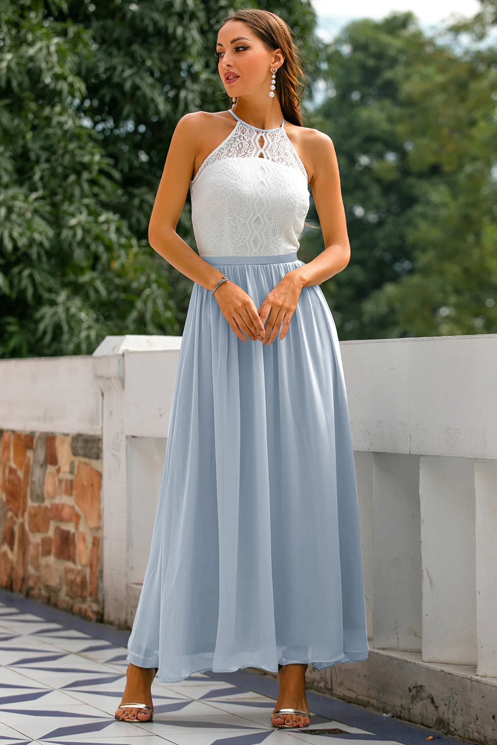 Halter neck maxi dress in a classic black color, versatile for any formal or evening event.