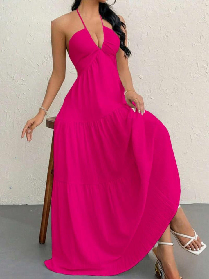 Beautiful women's elegant halter neck maxi dress, a versatile piece for summer and formal occasions.