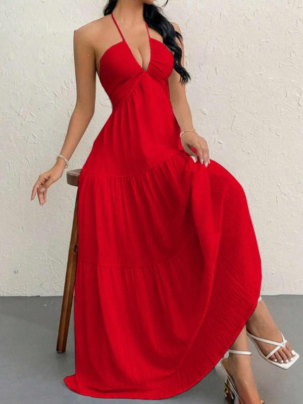 Halter neck women's maxi dress, designed with an elegant and flowing silhouette for event wear.