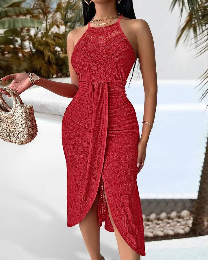 Chic halter neck maxi dress with a slit and hollow detailing, versatile for elegant parties or vacation evenings.