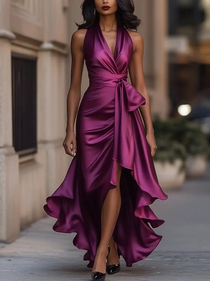 Stunning women's evening halter neck maxi dress, a formal long gown with an elegant wrap waist.