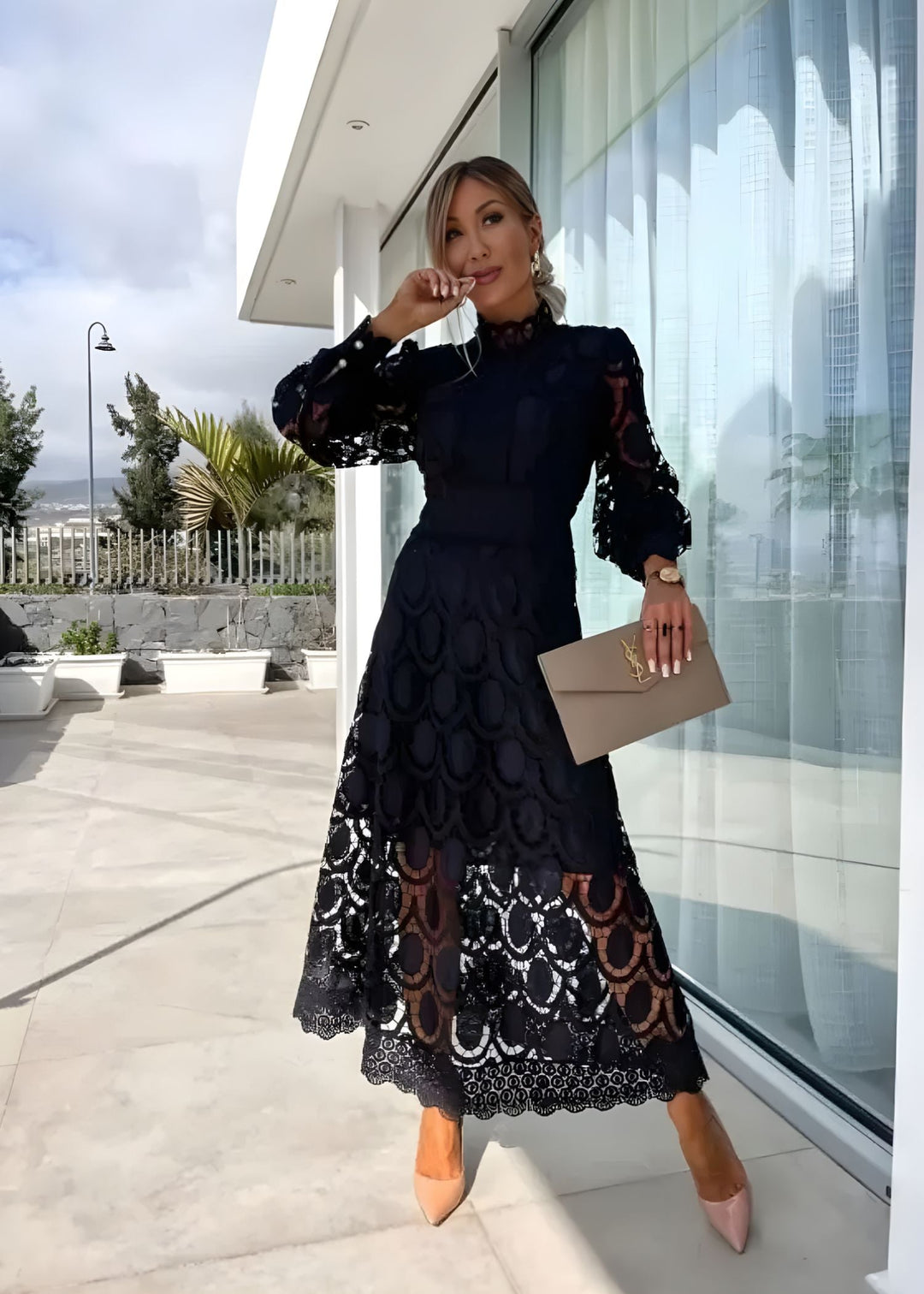 Stunning women's party maxi dress with a high-neck design and elegant puff long sleeves for evenings.